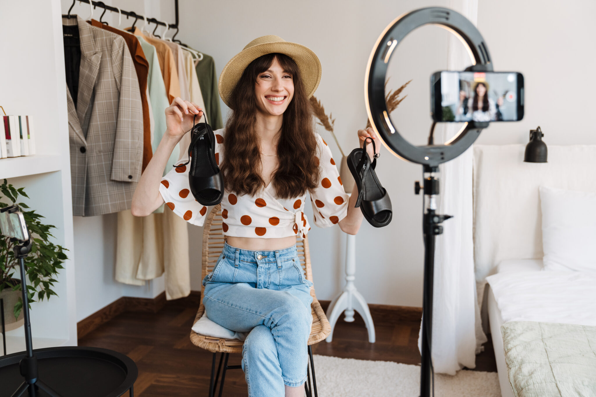 Woman utilizing Tiktok to sell fashion items