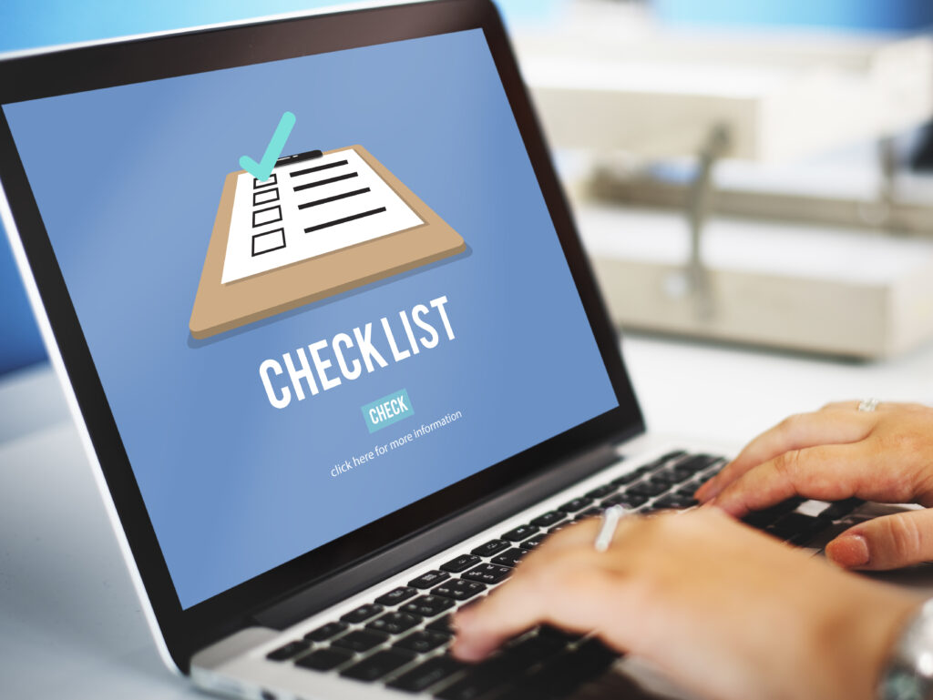 Digital checklist for task management and productivity showing a clipboard icon on a laptop screen, representing efficient business workflows and project organization