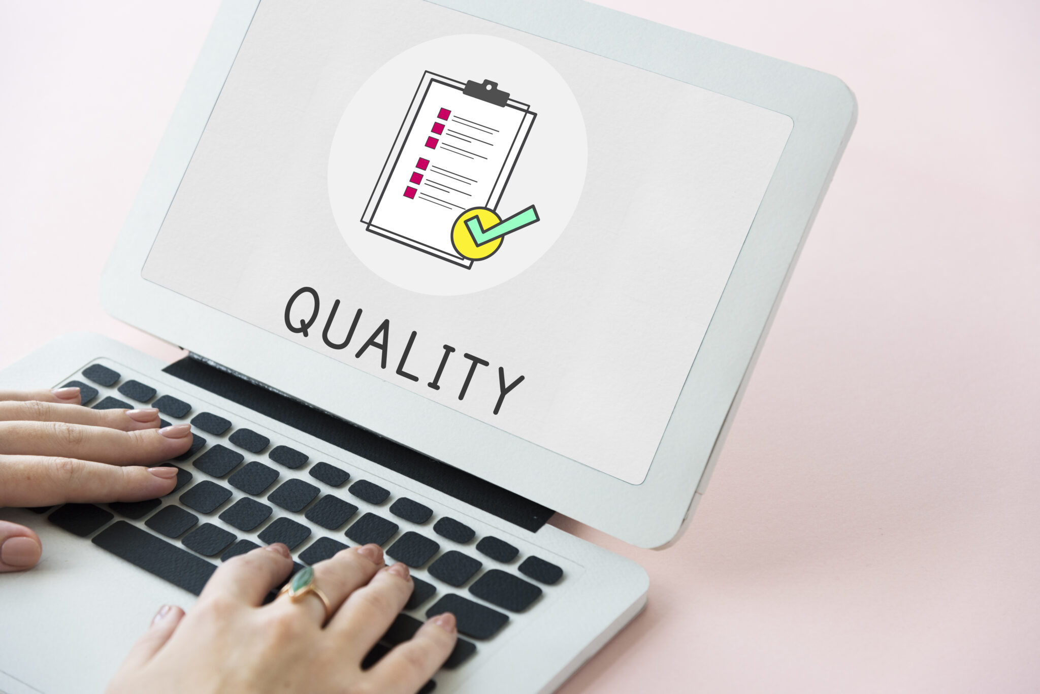 Quality assurance checklist on a laptop screen, representing business standards, QA compliance, process optimization, and professional excellence in service delivery