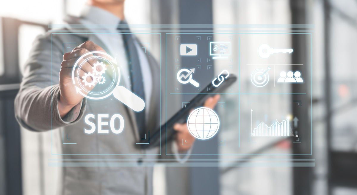 Business professional analyzing SEO strategy on a digital interface featuring search engine optimization icons, backlink building, content marketing, keyword research, website analytics, and organic traffic growth.