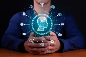 A man holds a smartphone displaying icons representing AI brain concepts, symbolizing AI's role in content creation