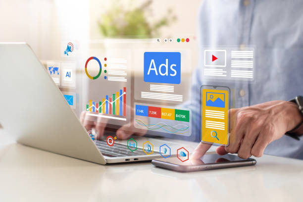 Digital advertising and online marketing concept with person using laptop and smartphone, displaying ads analytics, charts, AI tools, and mobile ad campaigns