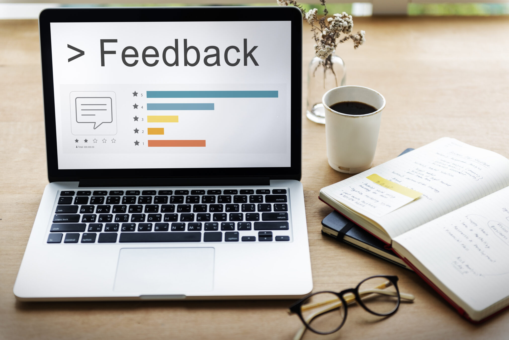 Laptop displaying a customer feedback dashboard with ratings and reviews, representing online reputation management, customer reviews, user feedback, business credibility, and improving SEO through customer experience and trust.