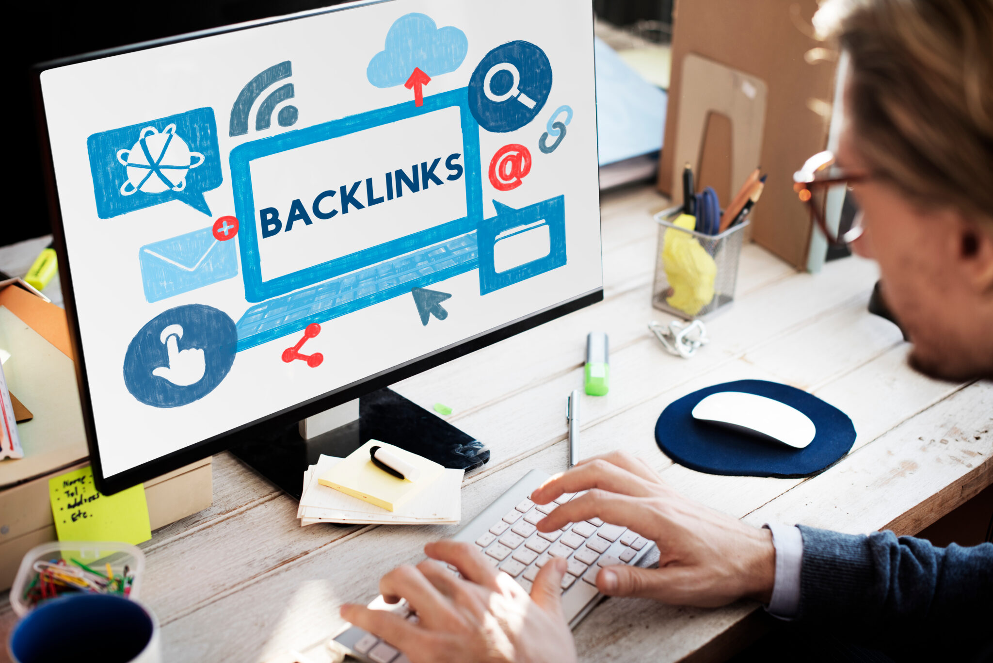 Person analyzing backlinks on a computer screen, representing backlink building, off-page SEO, link-building strategies, domain authority, search engine optimization, and improving organic search rankings through high-quality inbound links.